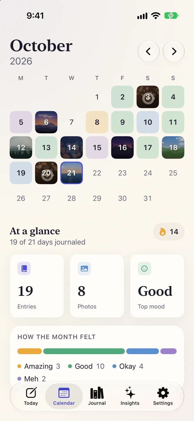 Calendar: October with each day tinted by mood, and an At a glance summary